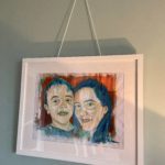 Photo of a painting of a mother and son