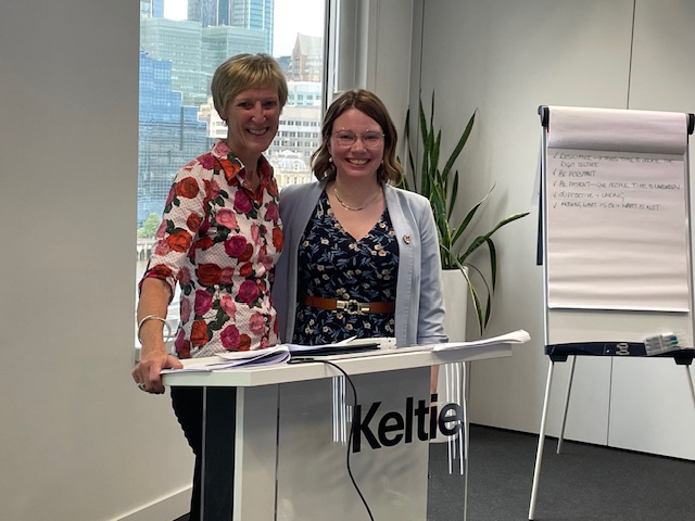 Stella and Laura smiling to the camera after the workshop