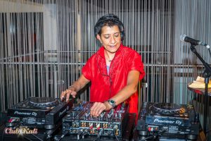 A photo of DJ Ritu at her decks